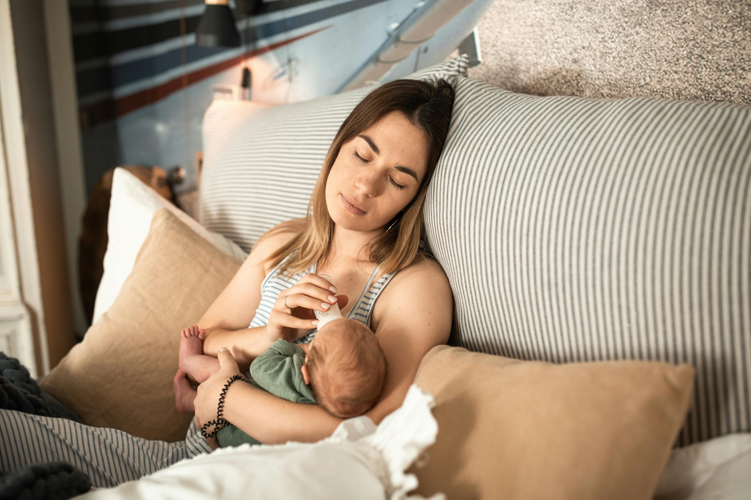 mother sleeping newborn baby peaceful